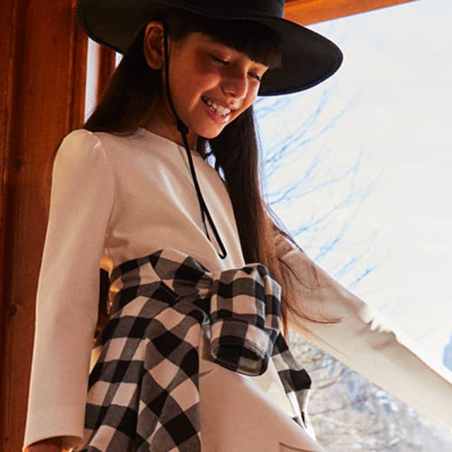 Il Gufo model white dress