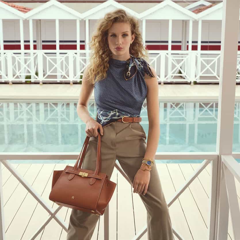 Girl with a brown leather bag