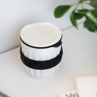 Cup with lid and sleeve